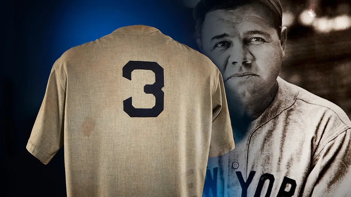 background wall of babe ruth with his jersey in front of it
