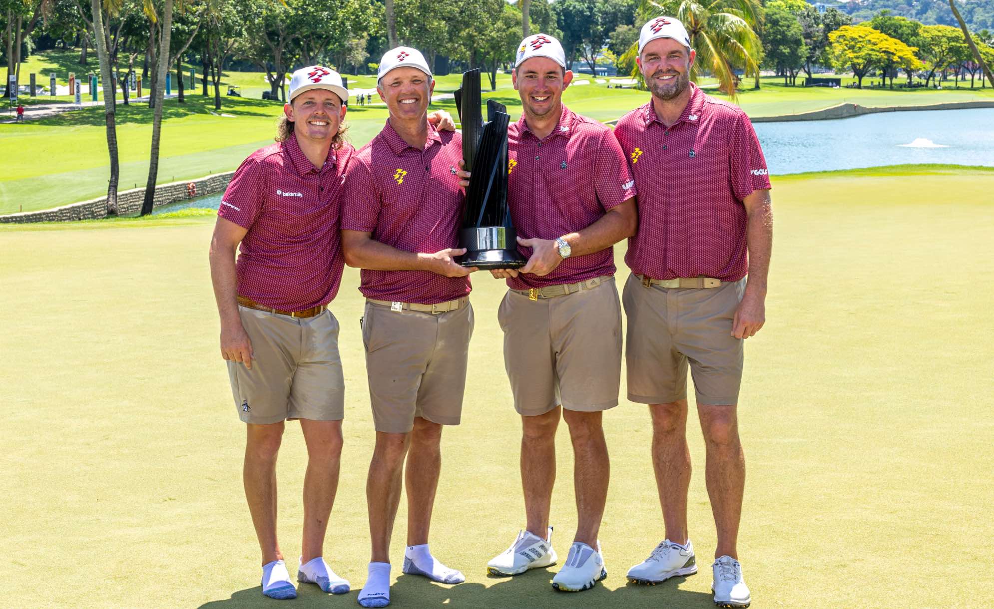Team Champions Cameron Smith, Matt Jones, Lucas Herbert and Marc Leishman of Ripper GC pose with the trophy after the final round of LIV Golf Singapore at Sentosa Golf Club