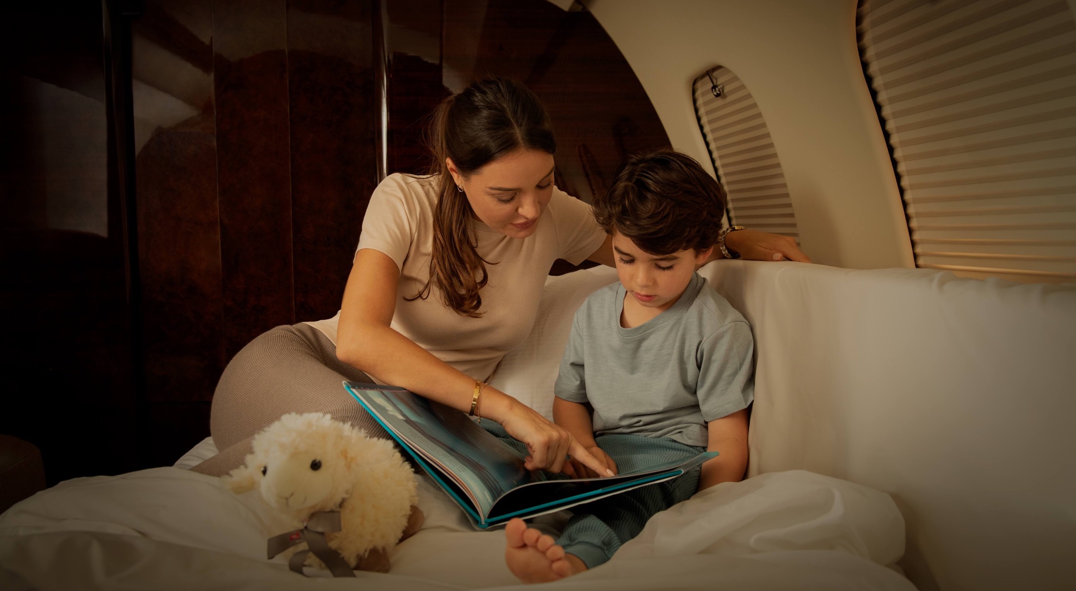 a mother and child on a private jet from TAG Aviation