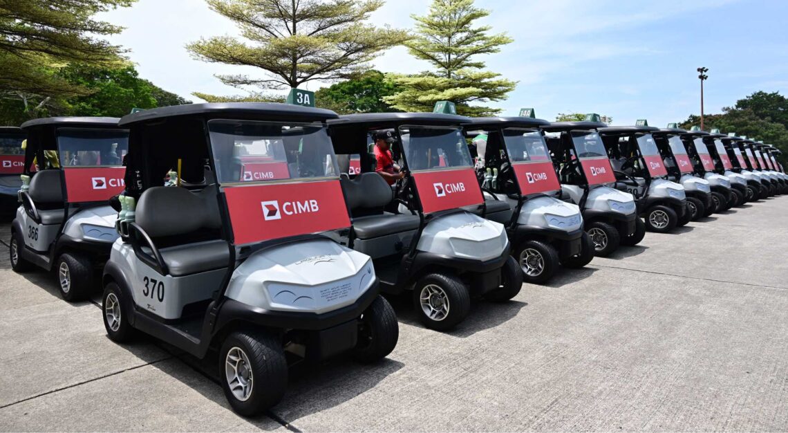 buggies decked with CIMB paraphernalia at Robb Report Singpore Golf Masters