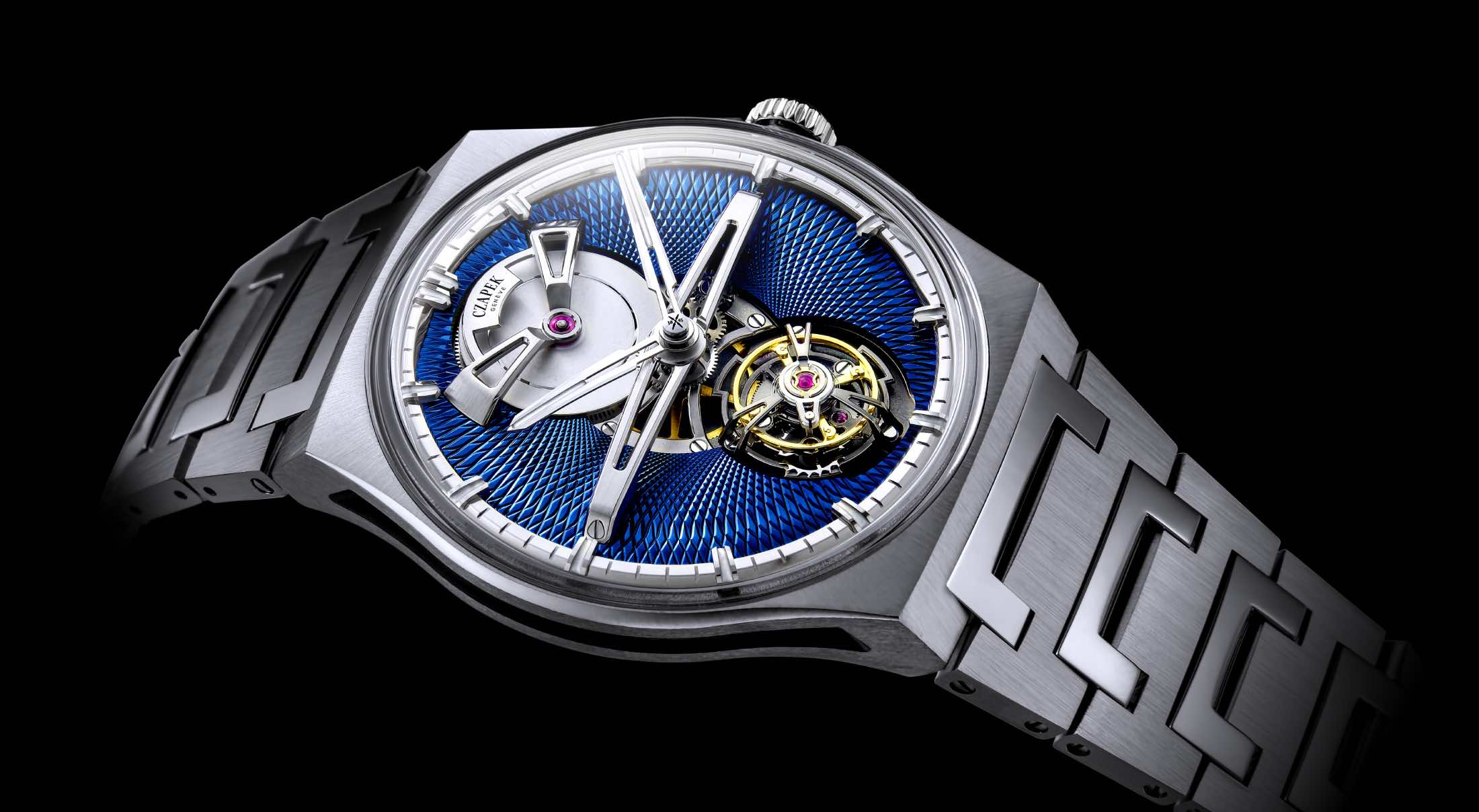 A close-up of a watch against a black background